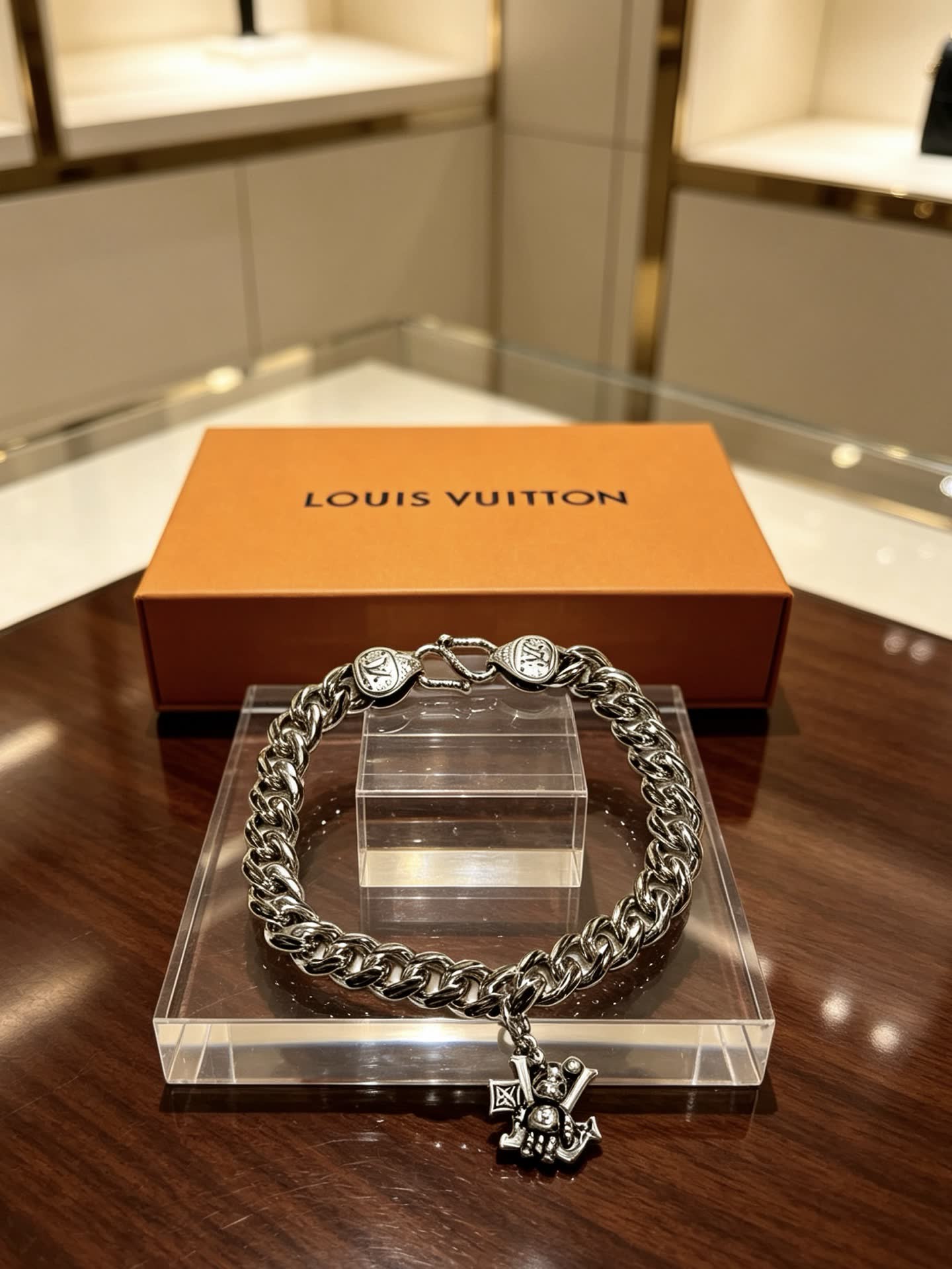 Louis Vuitton Silver Tone Bracelet with Monogram Charm